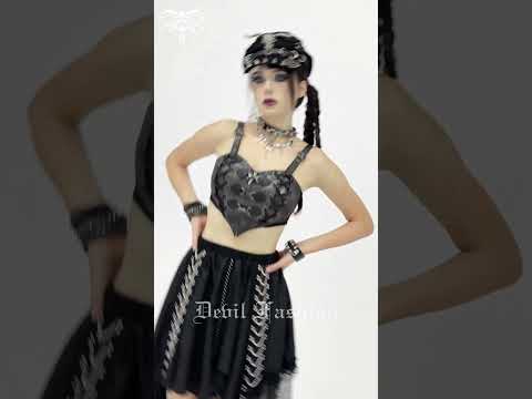 Gothic Faux Leather Lace Up Buckle Bralette Top worn with a black skirt, creating a bold punk outfit with edgy accessories.
