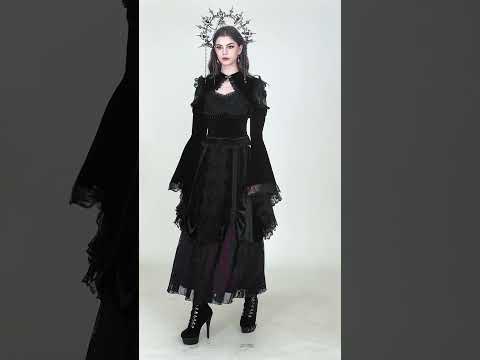 Model showcasing Black Gothic Lace Bolero Shrug with Bell Sleeves, styled with dramatic cape collar and flared sleeves.