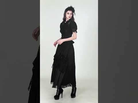 Black Victorian Gothic Blouse with Lace Sleeves showcased with a flowy skirt and stylish platform boots.