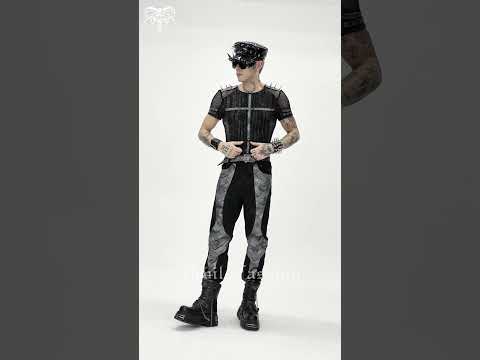Industrial Punk Mesh T-Shirt with Studded Cross Detail worn with punk style, featuring spiked shoulders and sleek design.