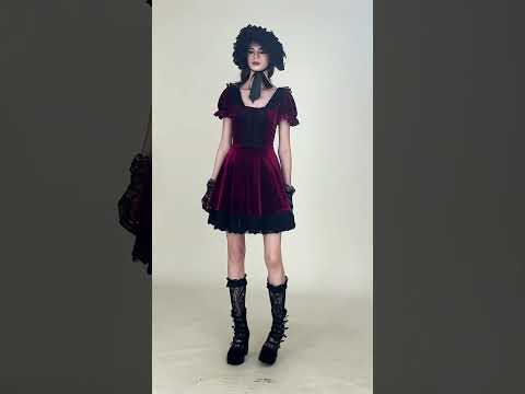 Gothic Women's Mini Dress with Lace Trim and Puff Sleeves on a model, showcasing dark skater style and vintage allure.