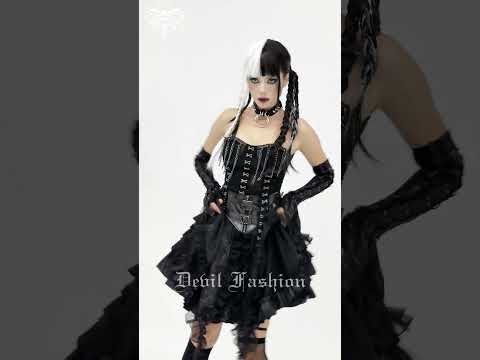 Black Gothic Chain Bustier Top with Lace Up Back showcased by a model wearing punk fashion.