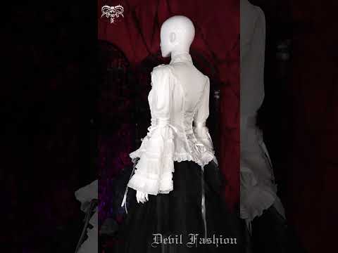 Elegant White Gothic Victorian Ruffle Sleeve Blouse displayed on mannequin, showcasing lace corset back and tiered cuffs.