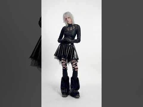 Gothic Black Leg Warmers with Chain Hardware Detail worn by a model in edgy fashion attire.