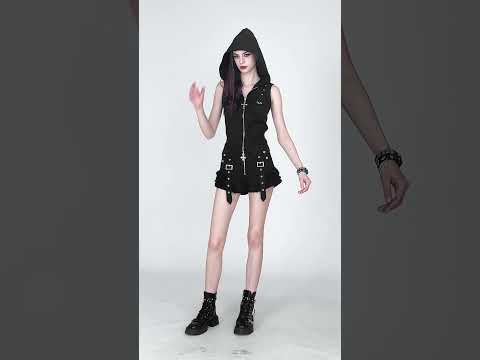 Women's Black Gothic Hooded Zip Top with Cross Pulls modeled by a model, showcasing a punk look with cargo pockets.