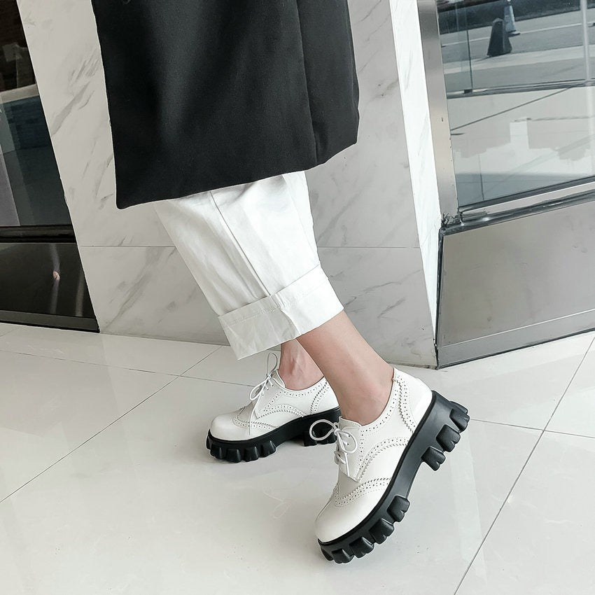 White PU leather platform women's shoes with square heel and round toe, styled with black rubber sole.