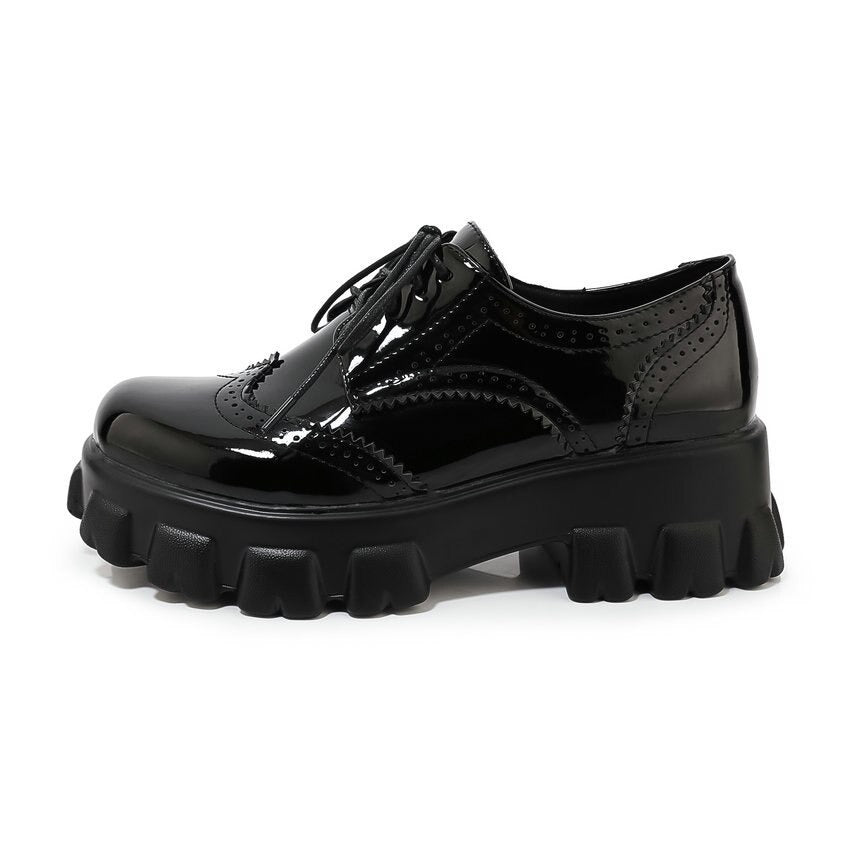 PU patent leather platform women's shoes with square heel, round toe, and edgy design for alternative fashion.
