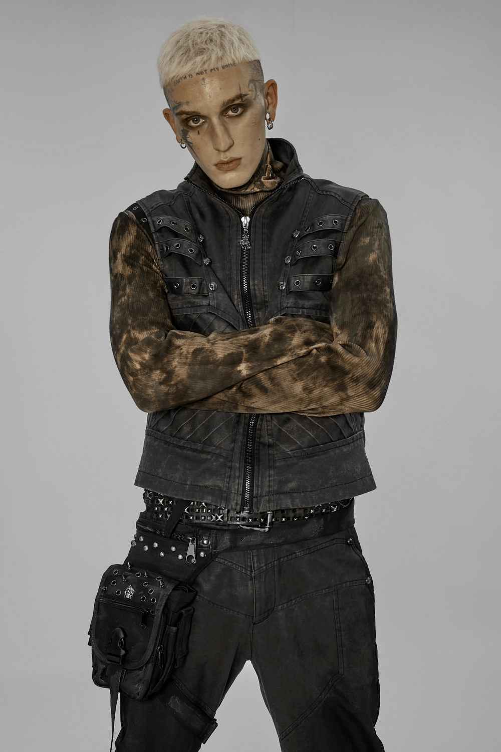Model showcasing a punk style outfit featuring a waist bag with rivets and zippers, exuding post-apocalyptic flair.