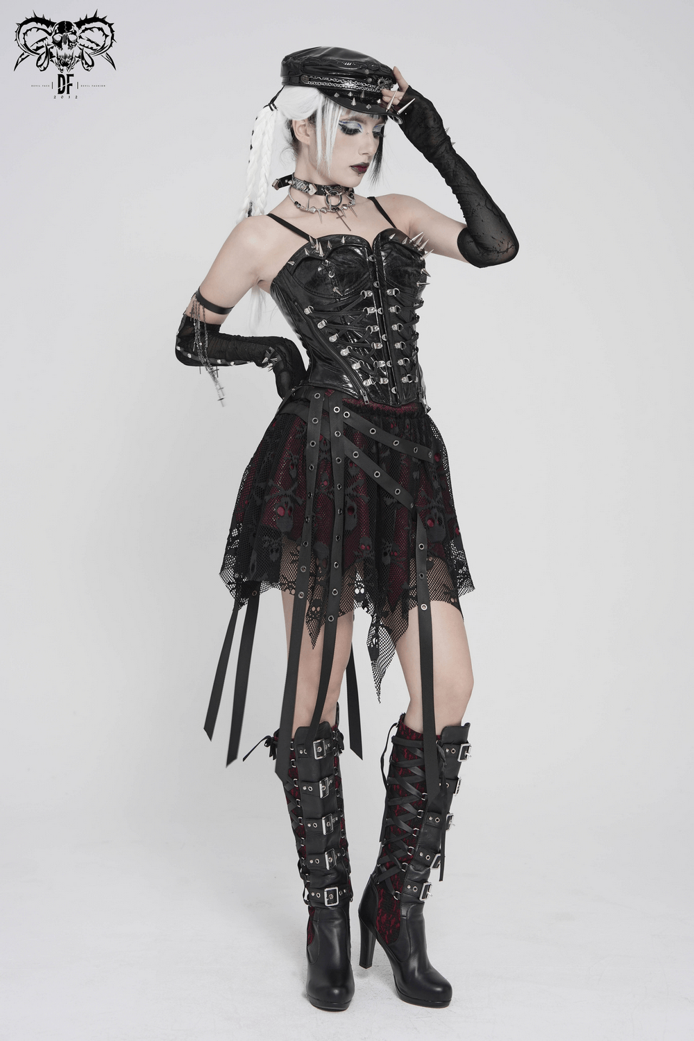 Punk Asymmetric Skirt with Belts and Star Buckles worn with gothic accessories and knee-high lace-up boots.