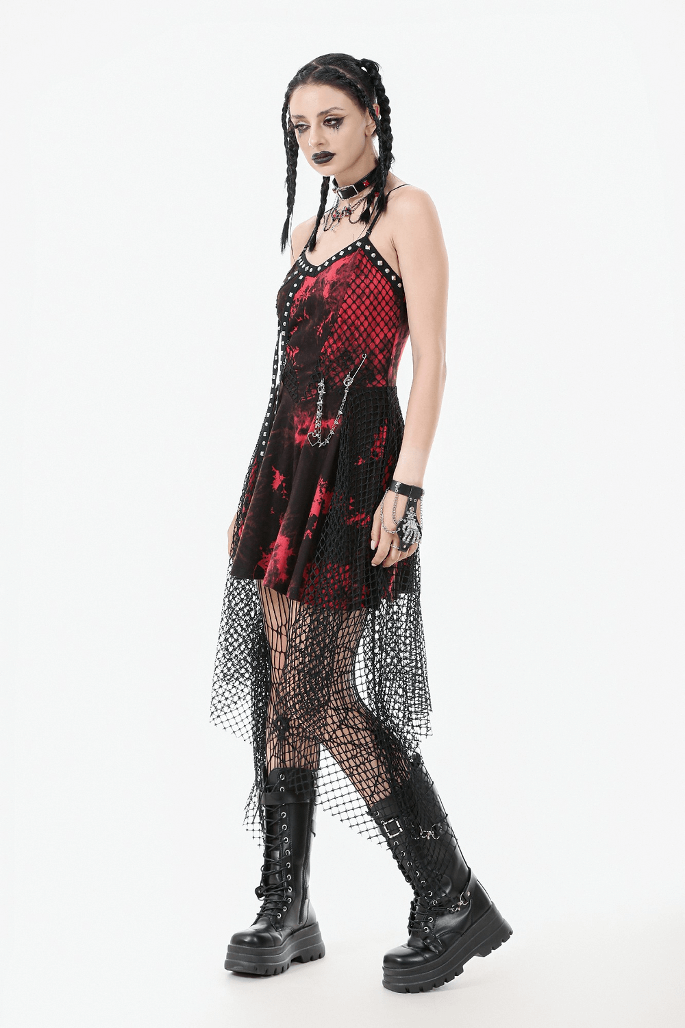 Punk asymmetrical gothic dress with studded chain and fishnet skirt, showcasing bold style and edgy fashion.
