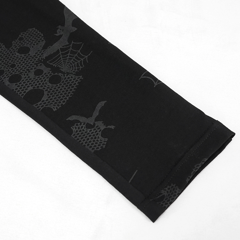 Close-up of punk asymmetrical black leggings showcasing unique spiderweb and bat print details.