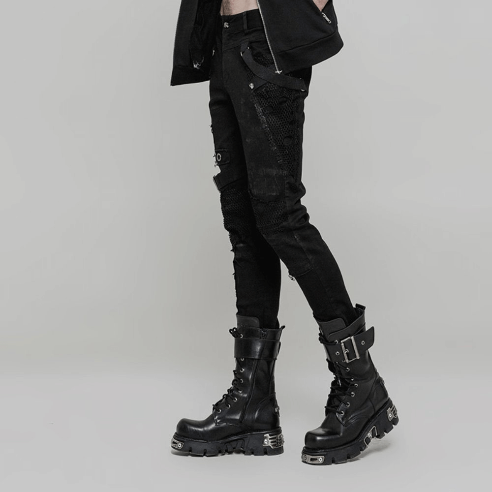 Punk black destroyed jeans with lace and buckle, paired with edgy black combat boots, showcasing a vintage rebellious style.