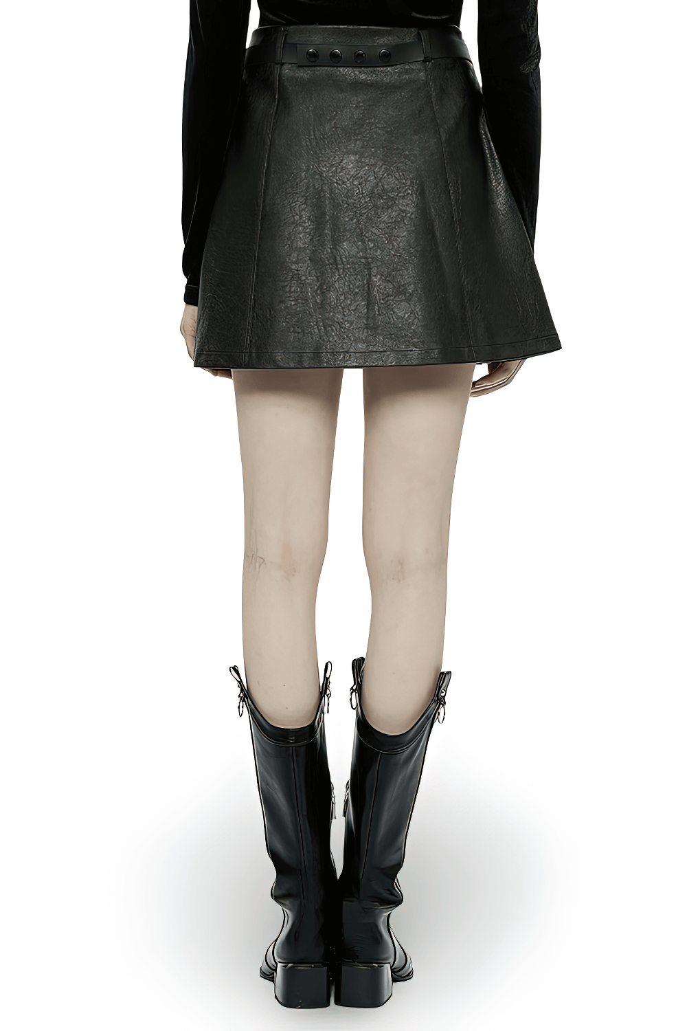 Back view of punk black faux leather A-line mini skirt with rivets, paired with stylish knee-high boots.