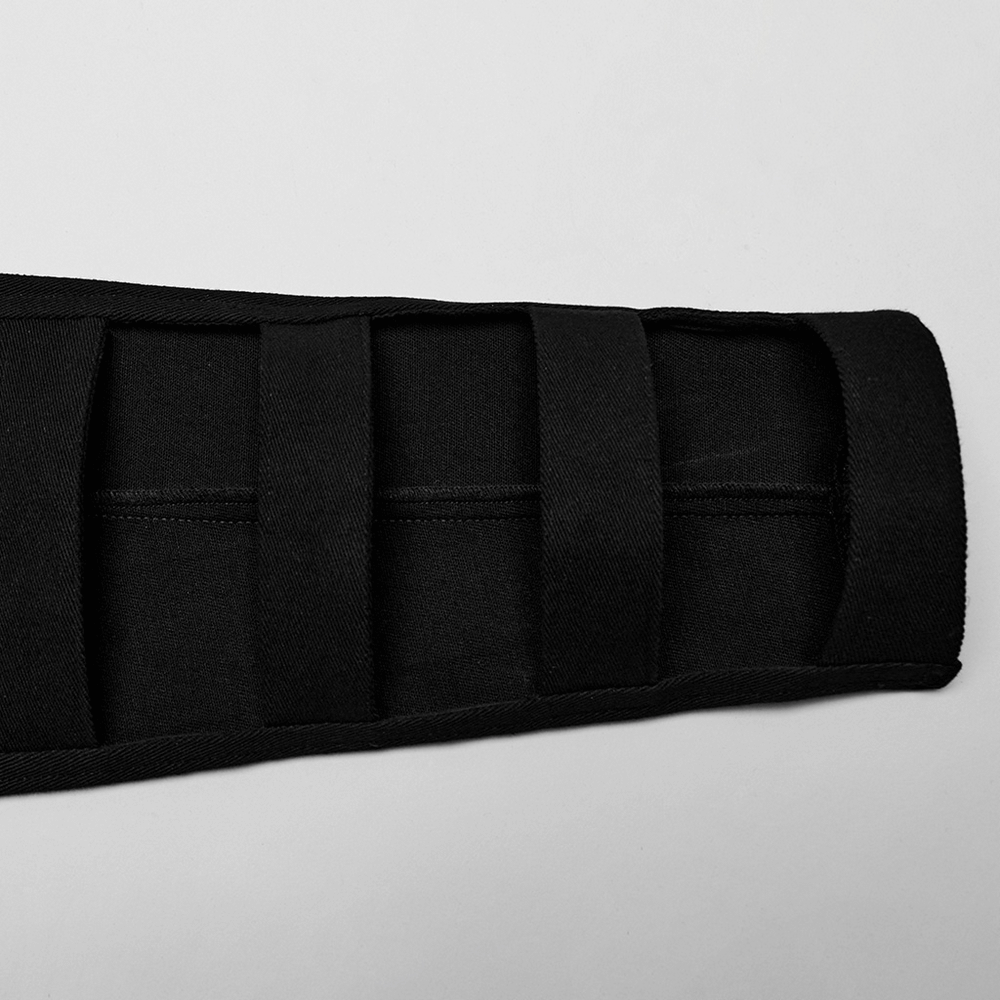 Close-up of the unique hollow loop strap sleeve of a punk black hooded short jacket.