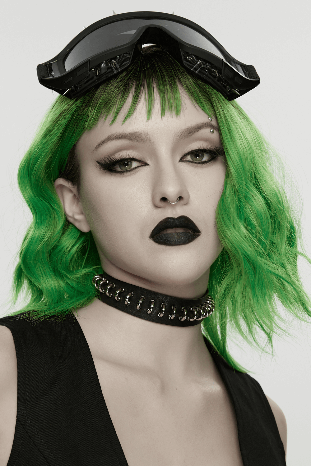 Punk Black Leather Choker with Metal Ring Details worn by a model with green hair and stylish goggles.