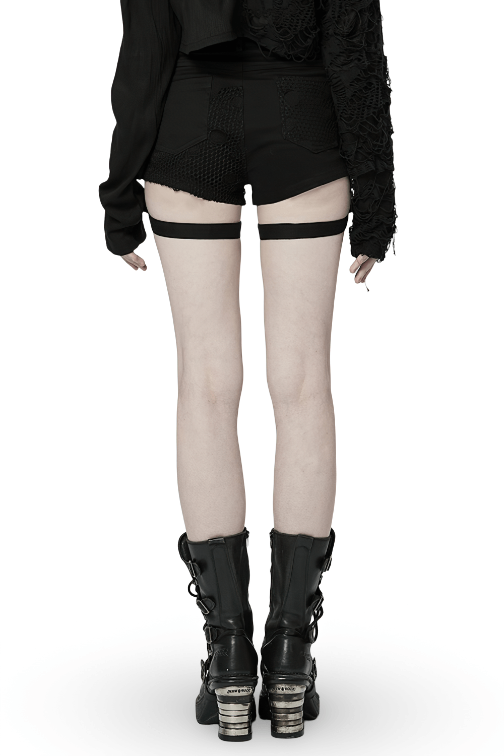 Back view of model wearing punk black mesh garter shorts with buckle straps and stylish black boots.