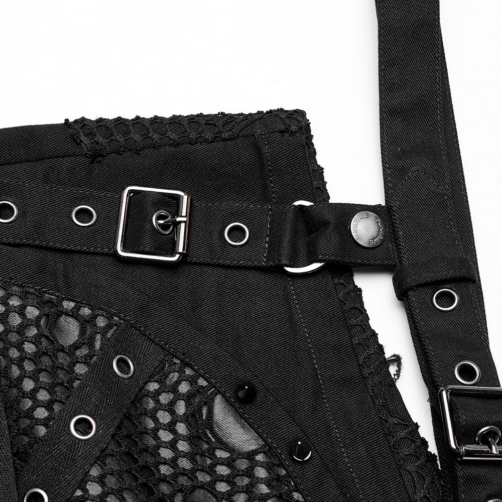 Close-up of punk black mesh garter shorts featuring buckle straps and intricate textures for a rebellious look.