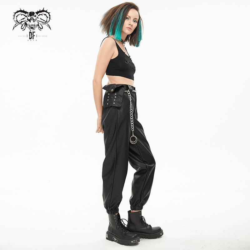 Punk black PU leather cargo pants with thick metal chain and waistbag, styled for women's fashion.
