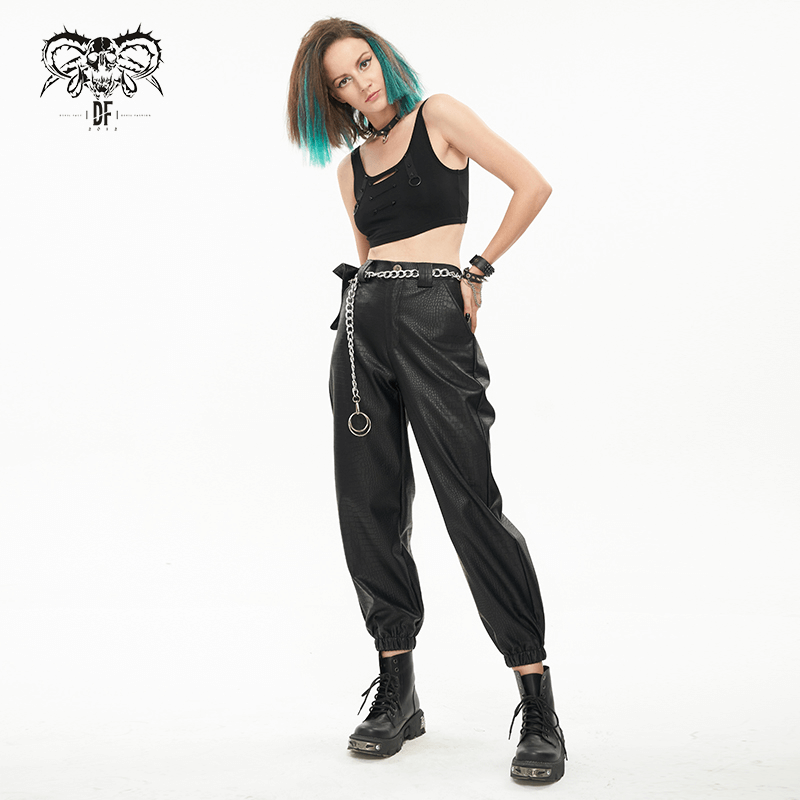 Punk black PU leather cargo pants with metal chain and waistbag, styled with a crop top, ideal for edgy fashion.