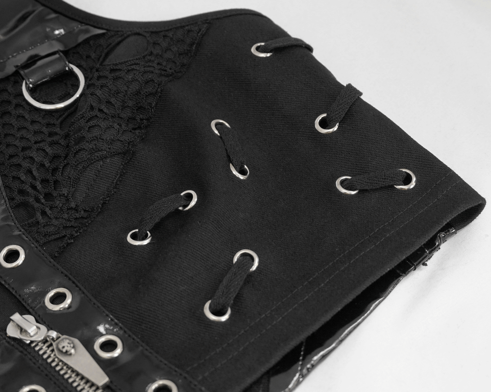 Close-up of a punk black sleeveless top with silver rivets and mesh detailing, showcasing trendy fashion elements.
