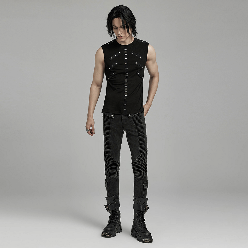 Punk black sleeveless rock top with studs, styled with edgy mesh design and black skinny jeans.