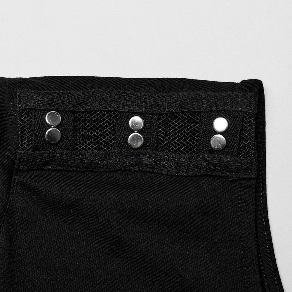 Close-up of punk black sleeveless top showcasing riveted mesh design and edgy studs.