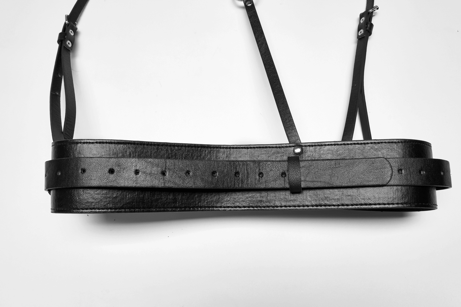 Punk bold PU leather harness with adjustable straps and metal detailing, perfect for edgy outfits.
