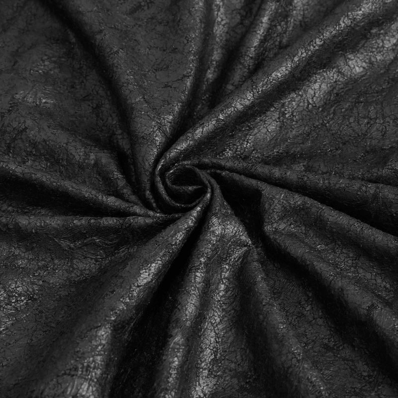 Close-up of textured black fabric, showcasing a unique crinkled design perfect for punk fashion.