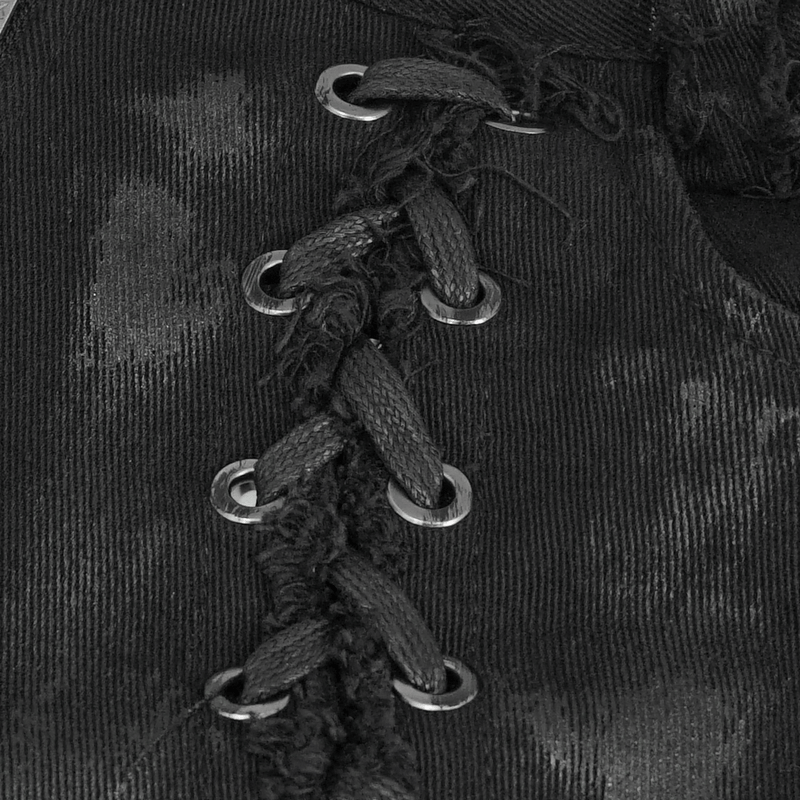 Close-up of punk trousers showcasing symmetrical lace-up details and distressed black fabric.