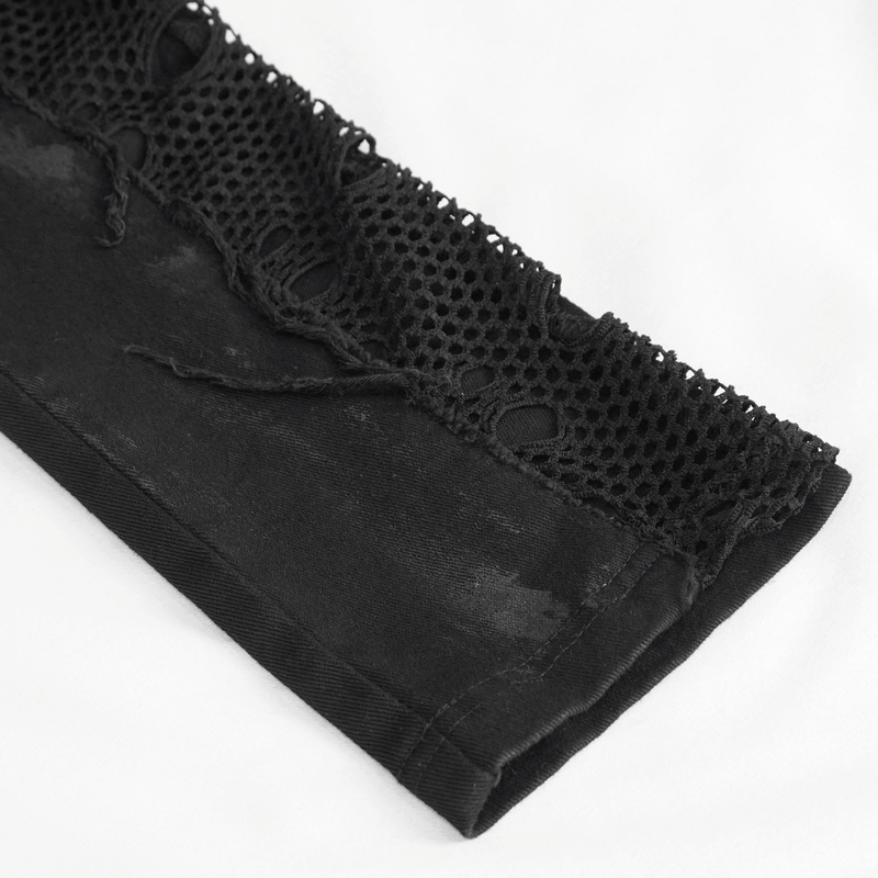 Close-up of black punk trousers featuring hole net detailing on the side for a stylish edgy look.