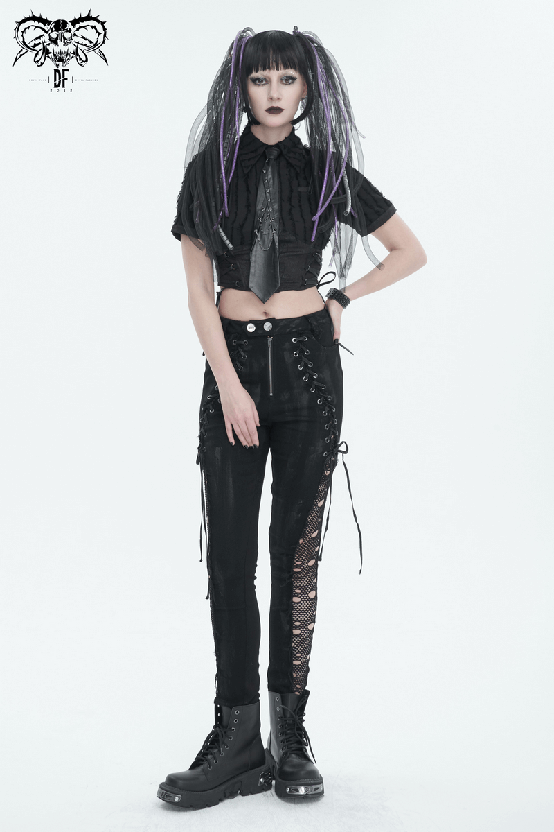 Punk women's buttoned zip trousers with hole net detail, lace-up sides, and stylish black aesthetic.