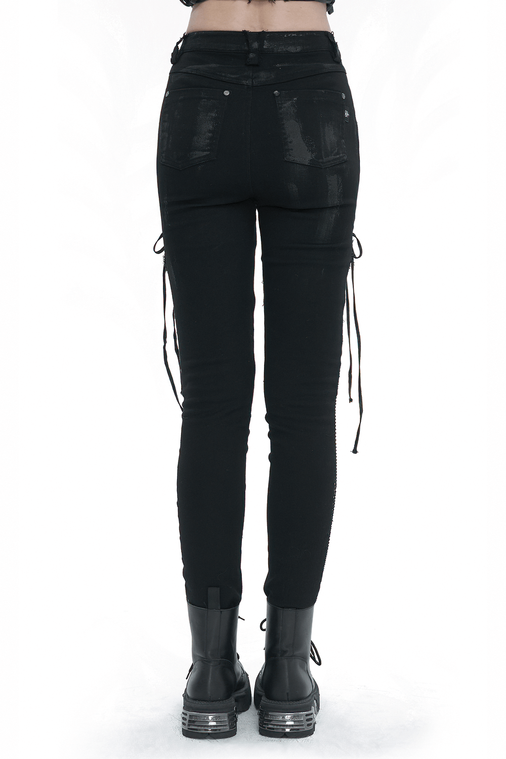 Back view of black punk buttoned zip trousers with lace-ups, showcasing edgy design and stylish details.
