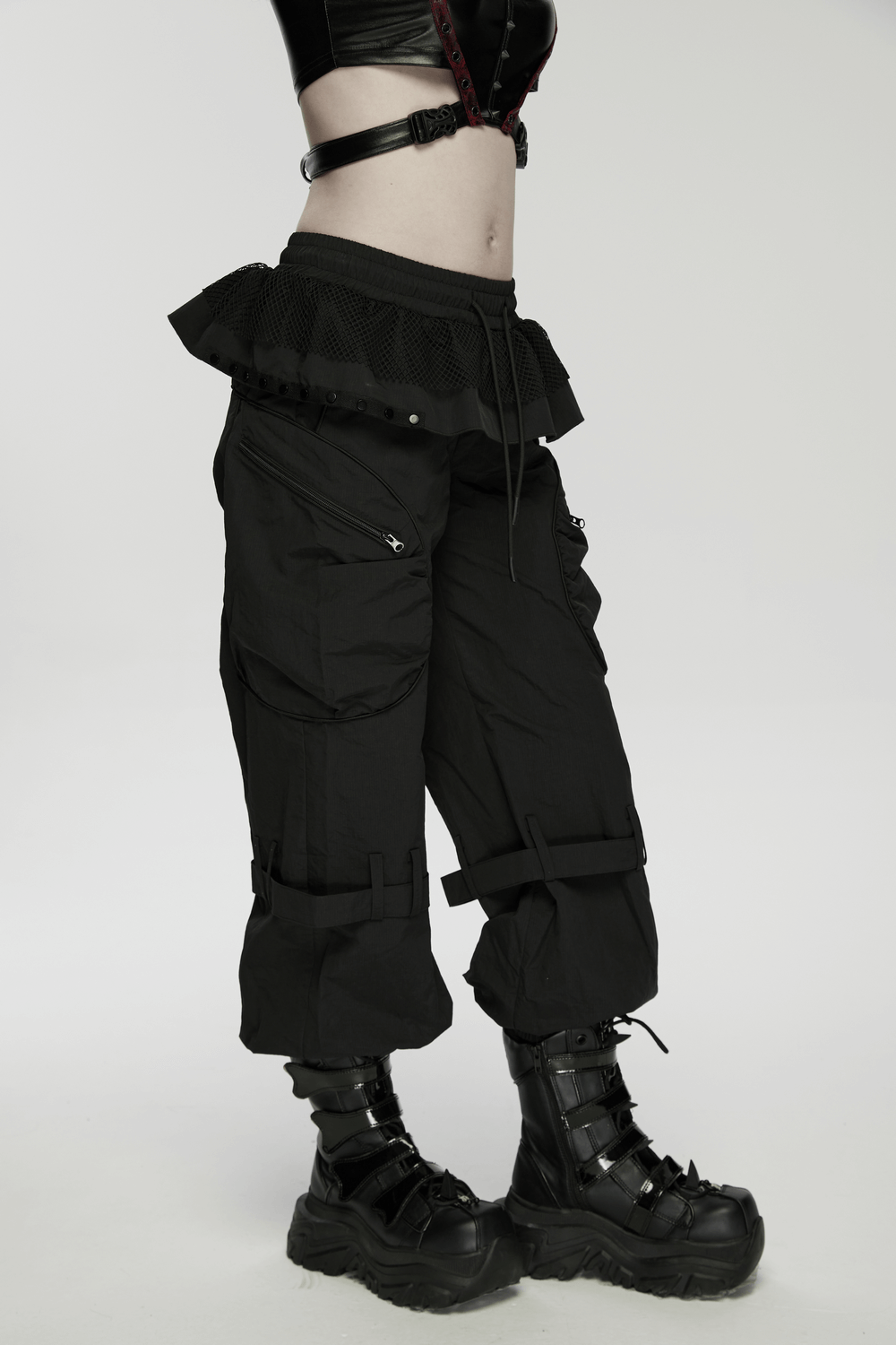 Punk Cargo Cuffed Pants with Mesh Waist Details showcased on model, featuring patch pockets and a relaxed silhouette.