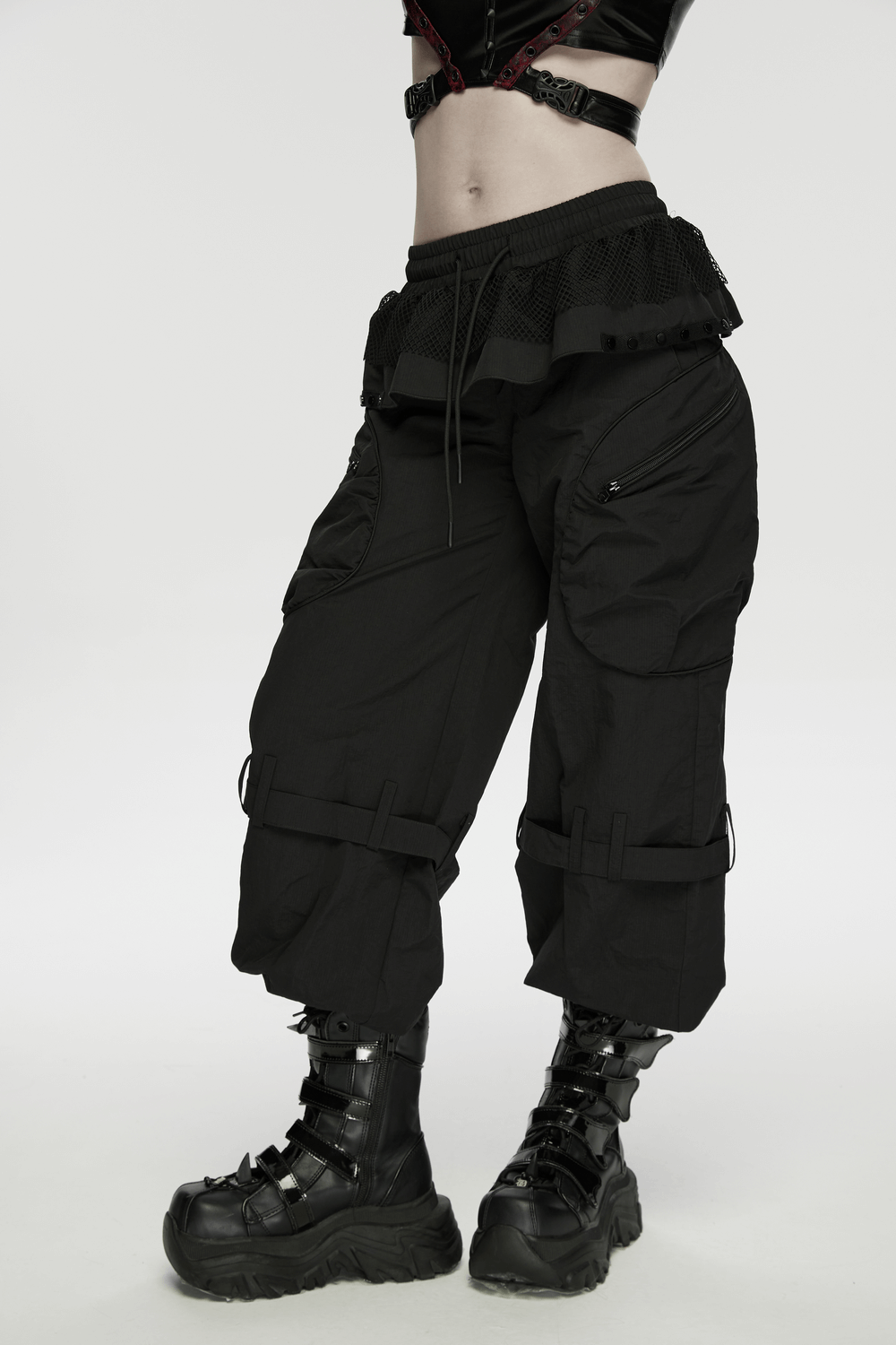 Punk Cargo Cuffed Pants with Mesh Waist Details showcased with bold street style and practical design.