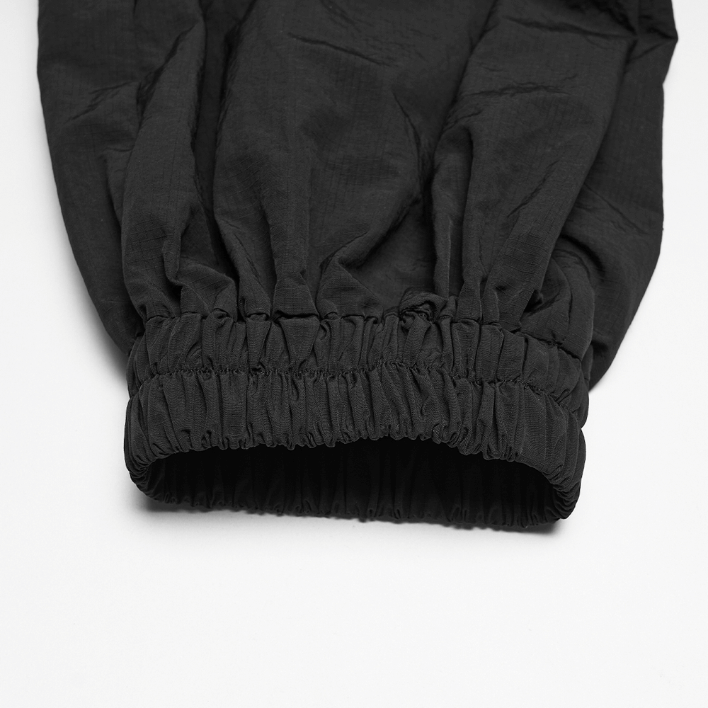 Close-up view of the cuff detail on Punk Cargo Cuffed Pants with Mesh Waist Details showing elastic waistband.