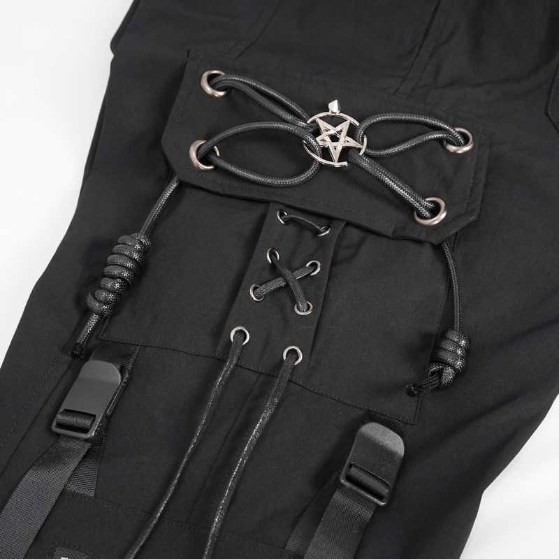 Close-up of black cargo pants featuring metal pentagram and stylish lacing details for a punk look.