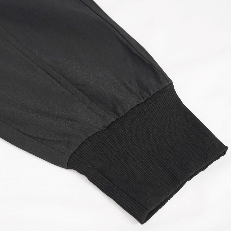 Close-up of the cuff of black cargo pants featuring elastic waistband for a comfortable fit.