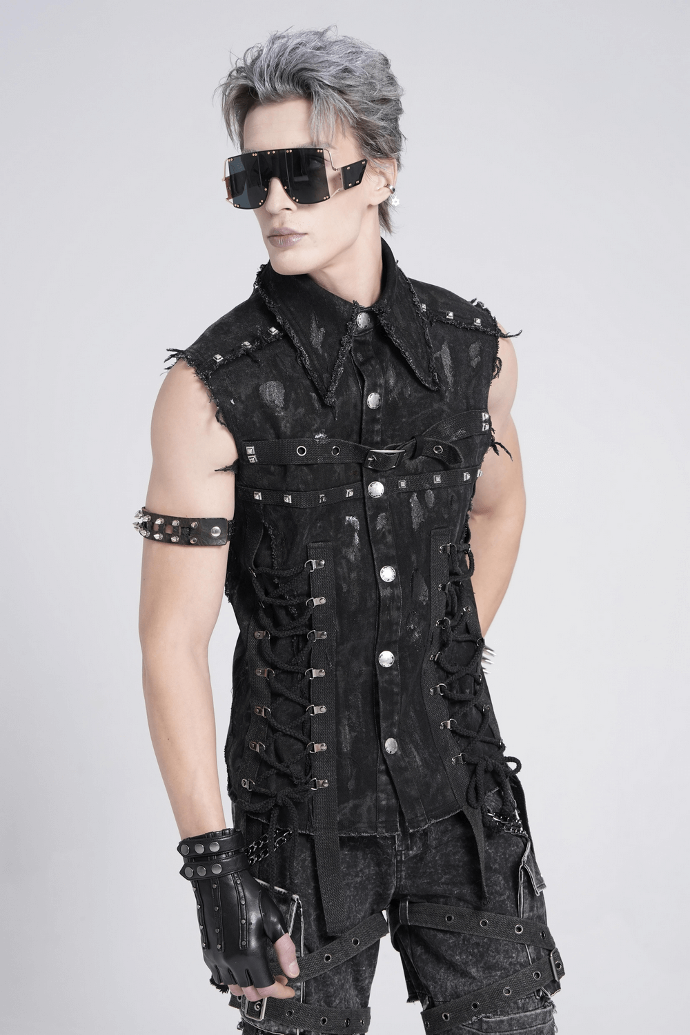 Punk denim shirt featuring lace-up sides and studded detail, designed for edgy fashion enthusiasts.