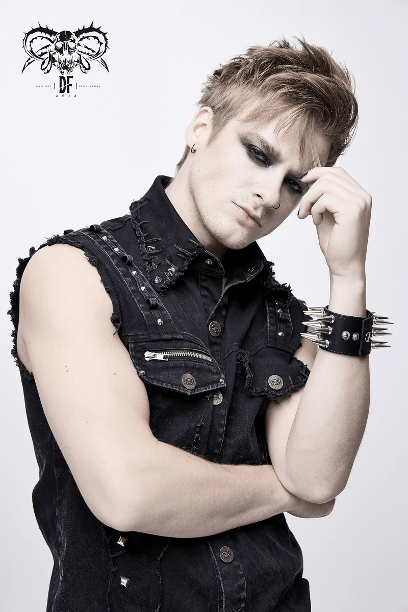 Punk denim sleeveless vest model showcasing edgy style with silver studs and a rebellious look.