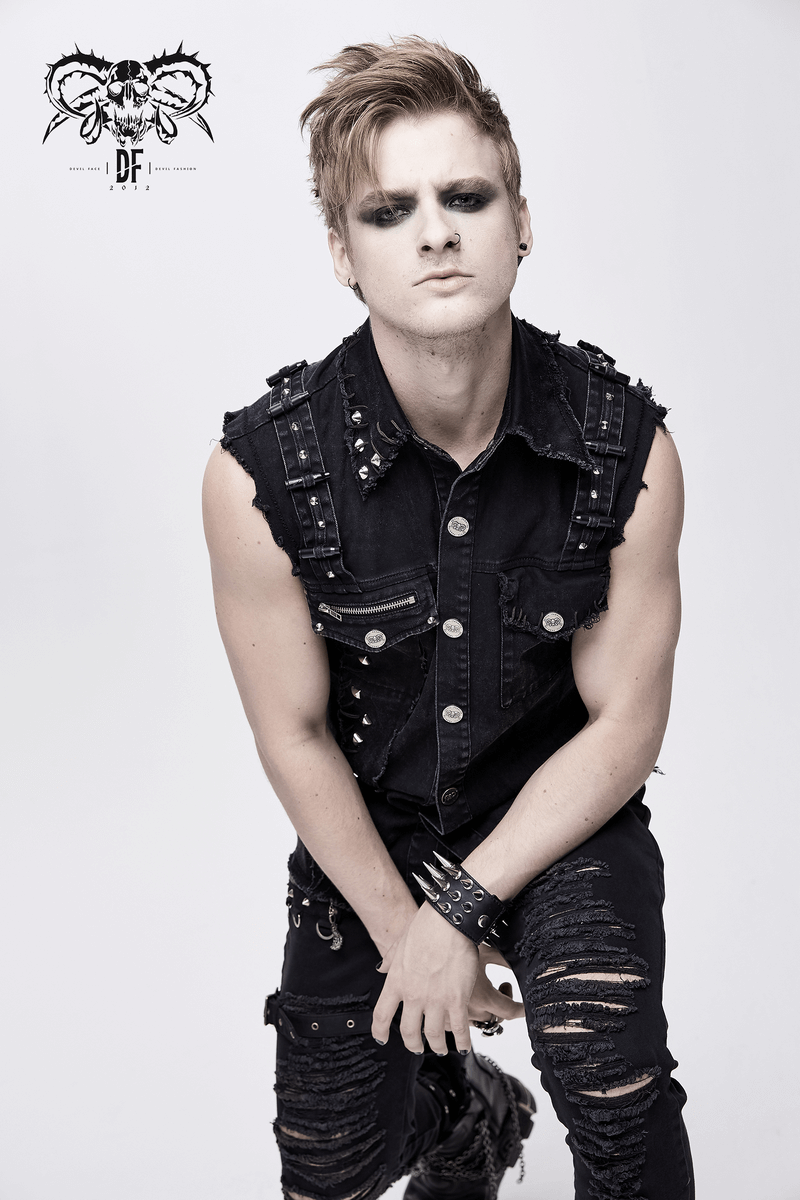 Punk denim sleeveless vest with pockets, styled with silver buttons and edgy accessories, perfect for alternative fashion.