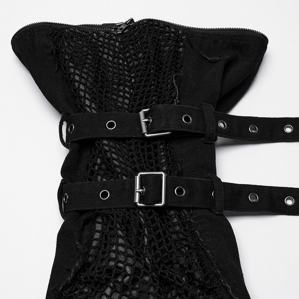 Close-up of punk detachable pants featuring mesh pockets, studded straps, and zippers for a bold style.