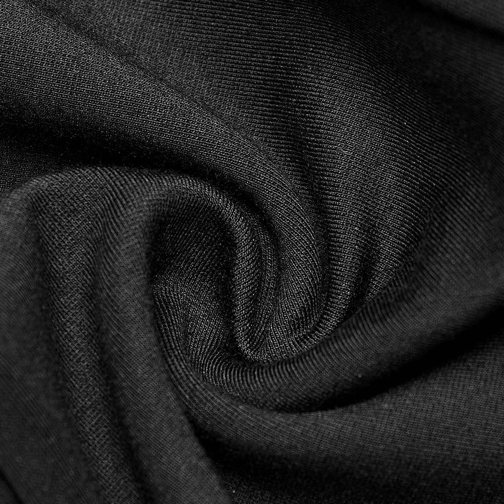 Close-up of soft black fabric showcasing the stretchy material of punk detachable faux leather pants.