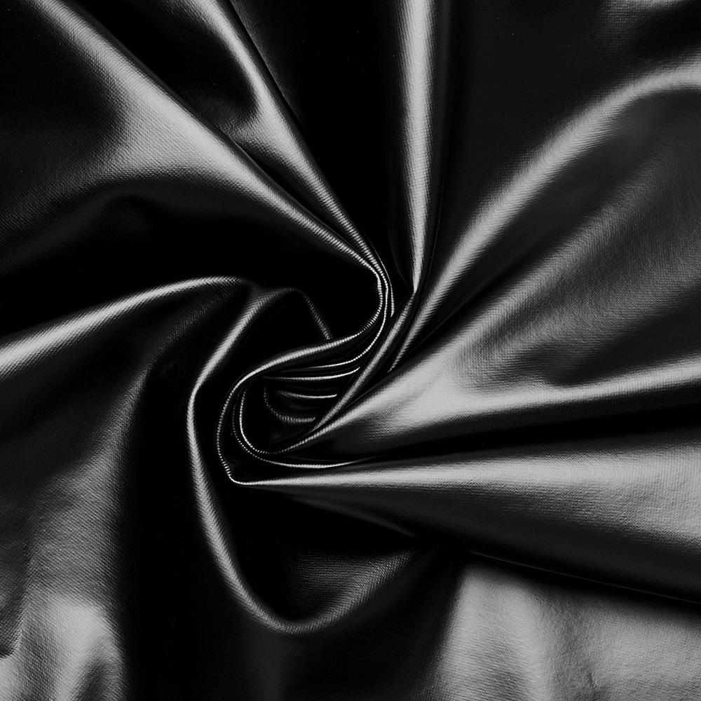Close-up of sleek black faux leather fabric, perfect for edgy fashion designs and stylish punk outfits.