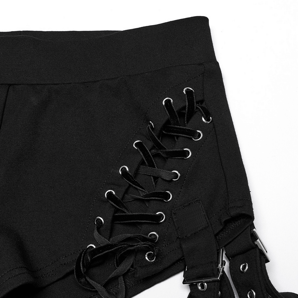 Close-up of punk detachable shorts featuring lace-up details and adjustable straps, perfect for edgy streetwear style.
