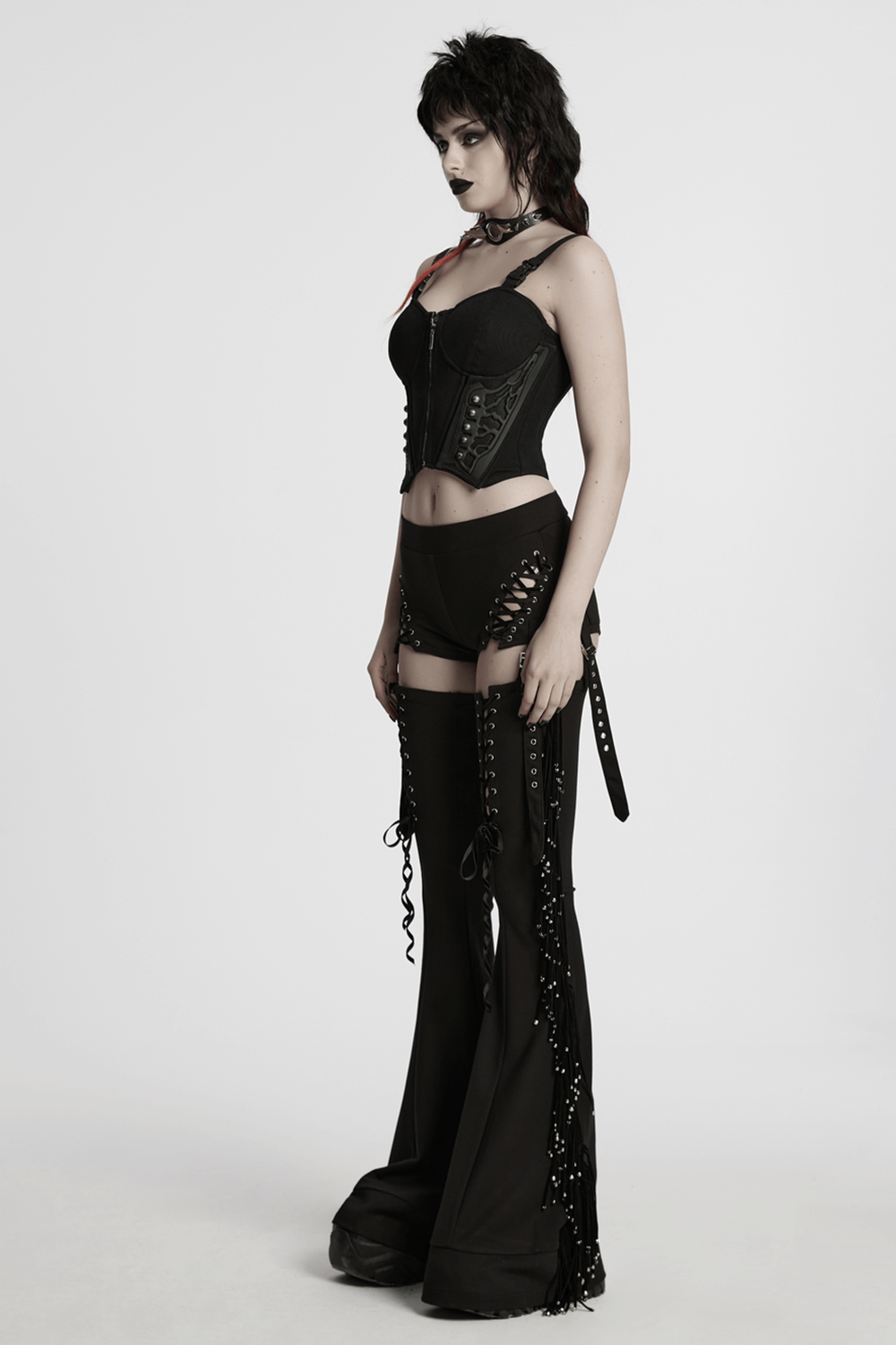 Model showcasing punk detachable tassel pants with drawstring and flared fit, paired with a black corset.