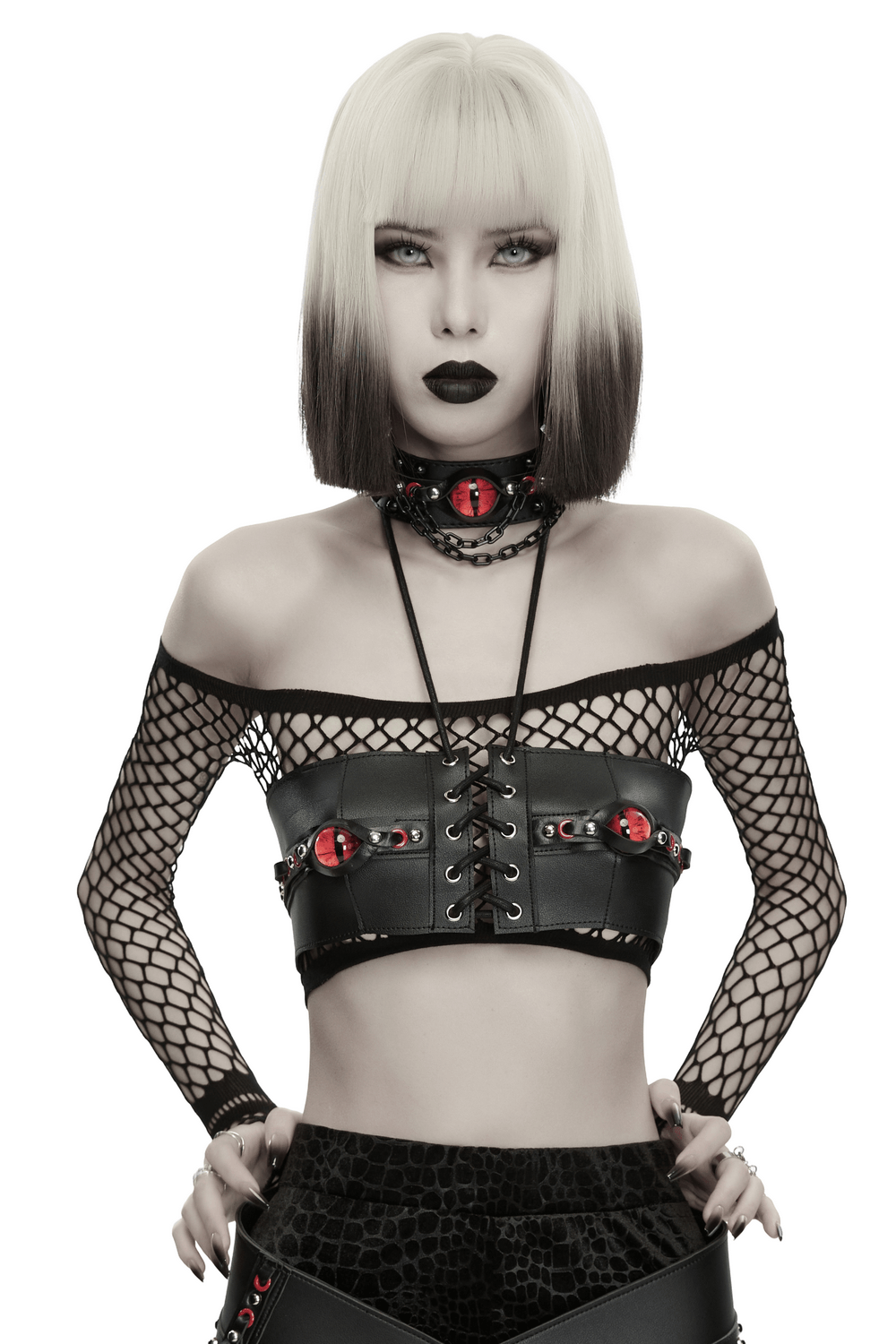 Punk Devil Eye Lace Up Faux Leather Bra Crop Top worn by a model with edgy style and bold accessories.