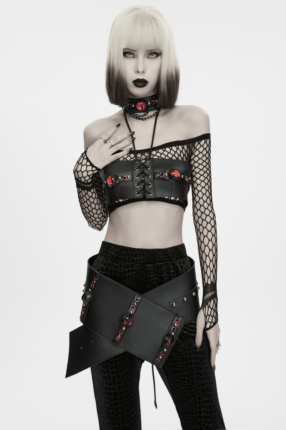 Punk Devil Eye Lace Up Faux Leather Bra Crop Top showcased on a model with gothic styling and striking 3D eye accents.