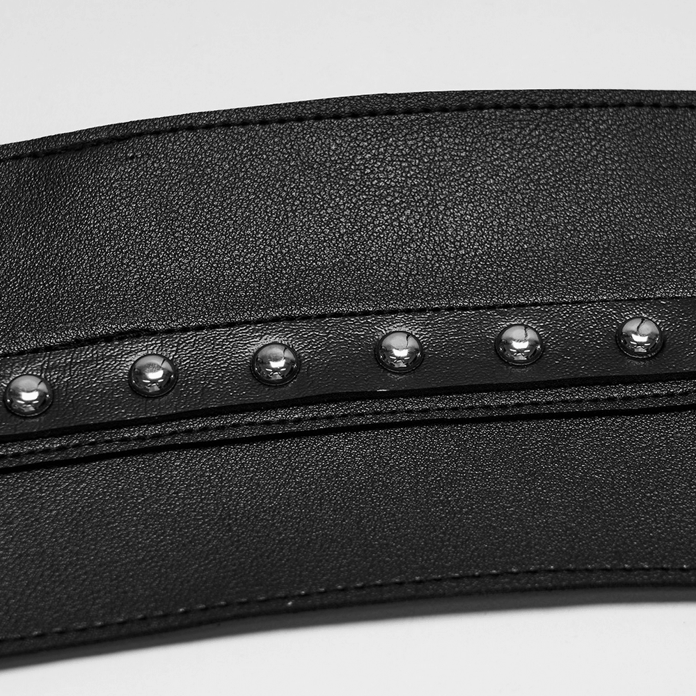 Close-up of the Punk Devil Eye Lace Up Faux Leather Bra Crop Top showing lace and metallic studs.