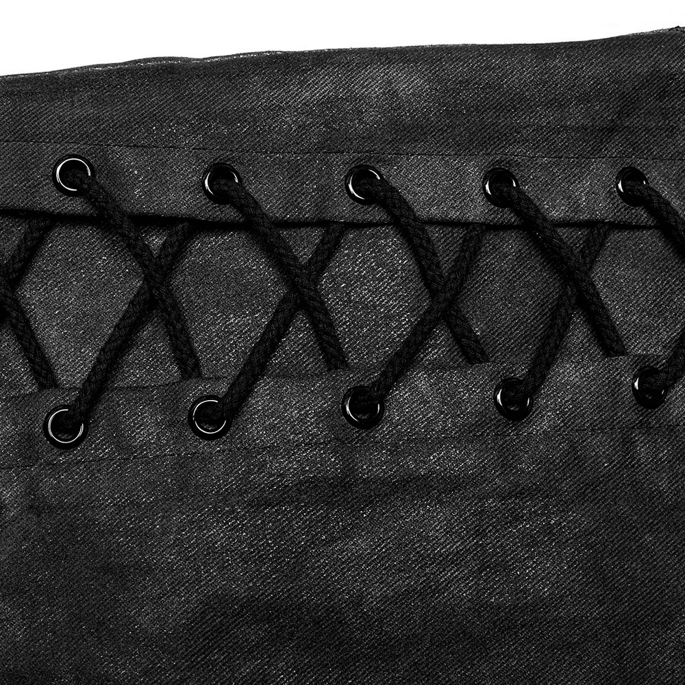 Close-up of black distressed cargo pants with decorative lacing and drawstrings, showcasing edgy streetwear style.