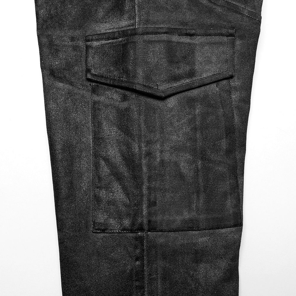 Close-up of distressed black cargo pants showing unique texture and side pocket detail for punk streetwear style.